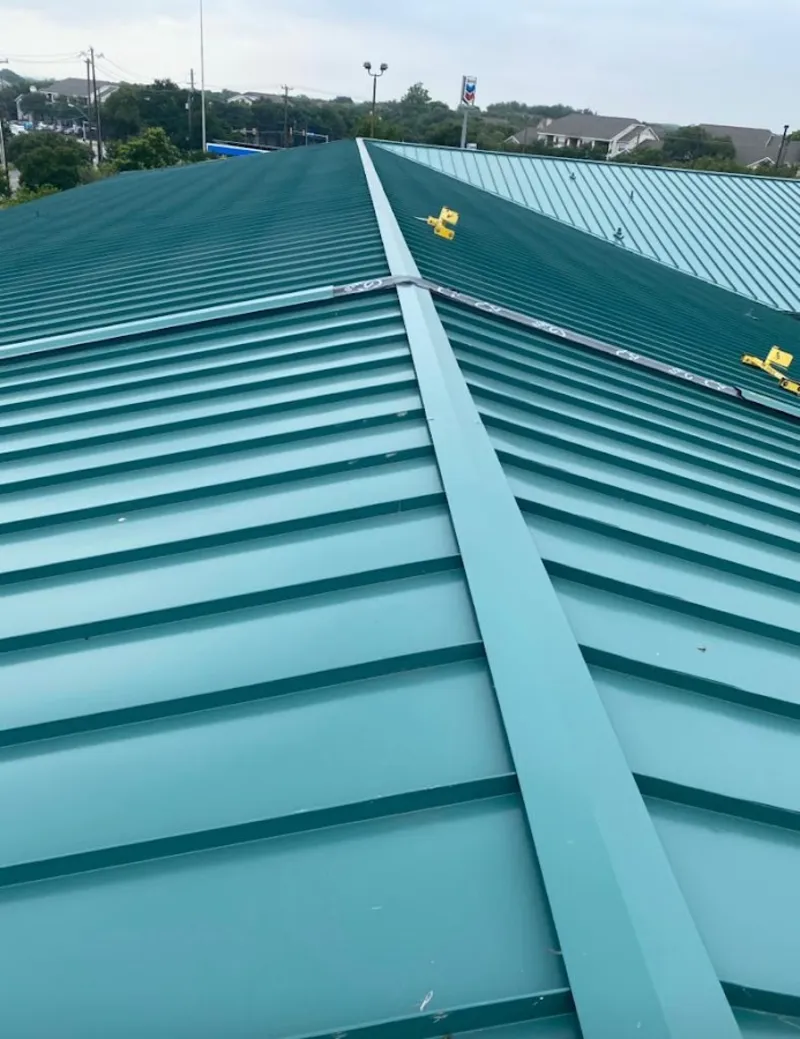 Green commercial metal roof ridge and valley for Metal Roof Repair in Tuttle
